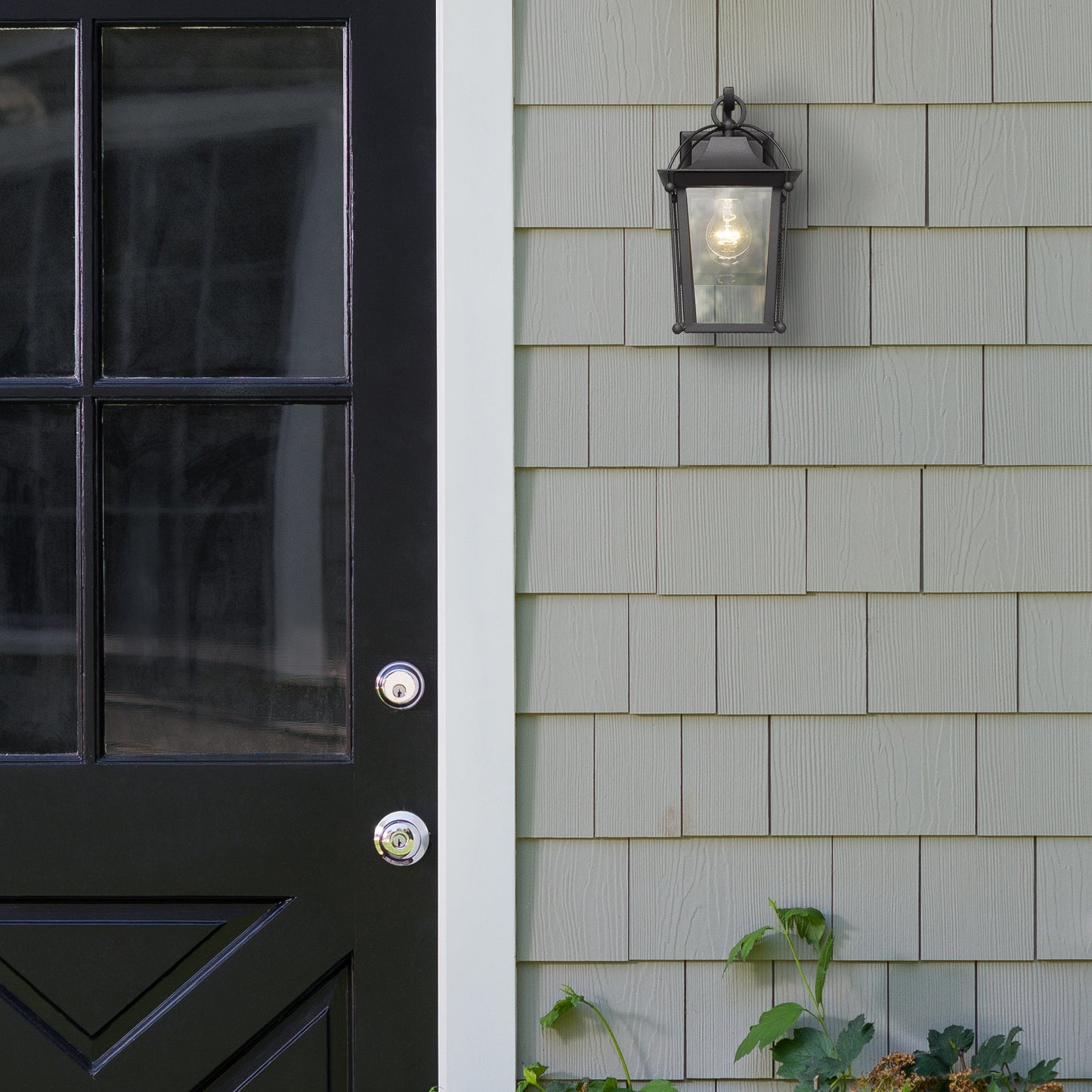Warwick- Outdoor Medium Wall Sconce in Natural Black with Clear Glass Shade
