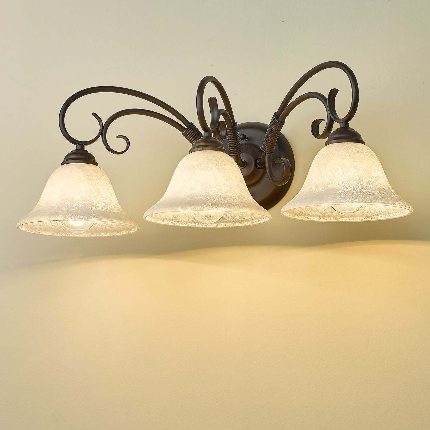Hercules 3 Light Bath Vanity in Rubbed Bronze with Tea Stone Glass