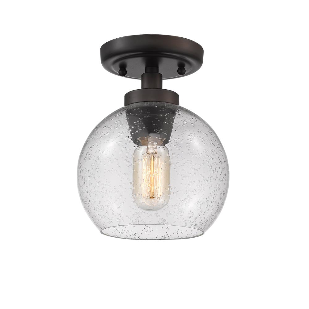 Garrick Flush Mount in Rubbed Bronze with Seeded Glass